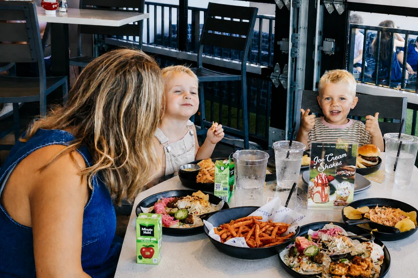 Children eating at a PopStroke table