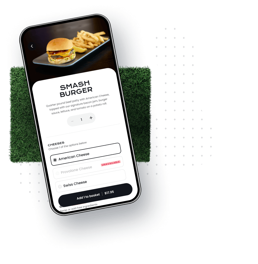 A cellphone displaying a scorecard app, a golf ball flying over it