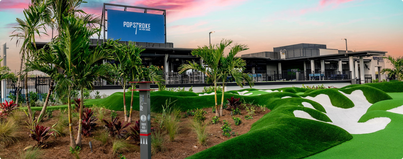 A scenic golf course showcasing meticulously designed grass and trees.