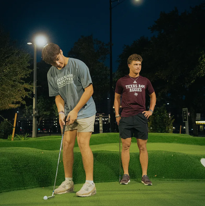 Texas A&M members enjoying PopStroke