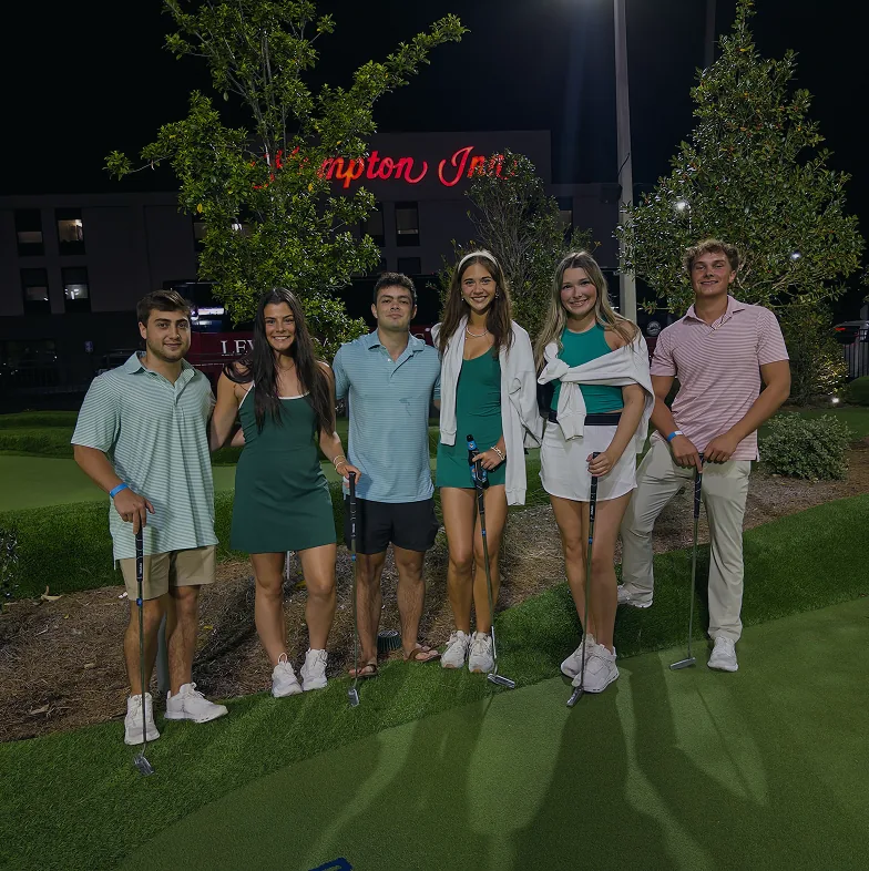 PopStroke guests enjoying a round of mini golf